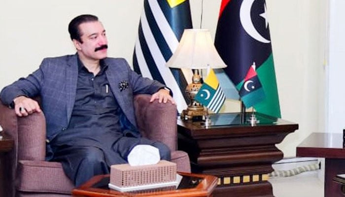 Azad Jammu and Kashmir (AJK) Prime Minister Faisal Mumtaz Rathore is seen in a meeting on December 2, 2025. — Facebook@faisal.rathore.5