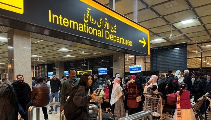 A student leaving for the United States at Jinnah International Airport, Karachi, Pakistan, on January 21, 2023. — APP/File