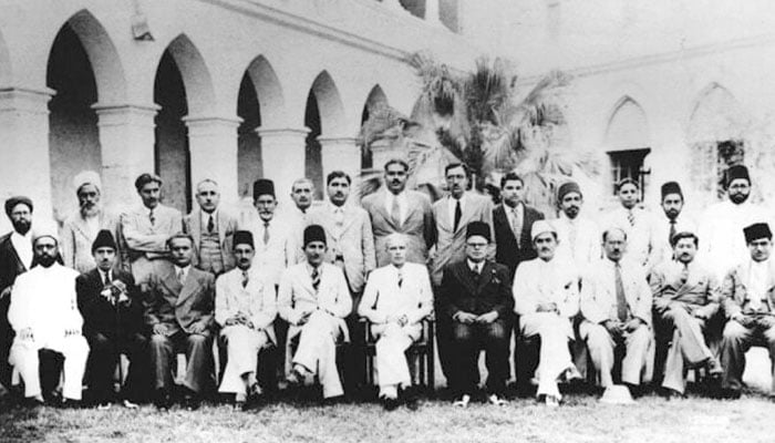 Founder of Pakistan, Quaid-e-Azam Muhammad Ali Jinnah, in a group photo at Sindh Madrastul Islam. — The News/File
