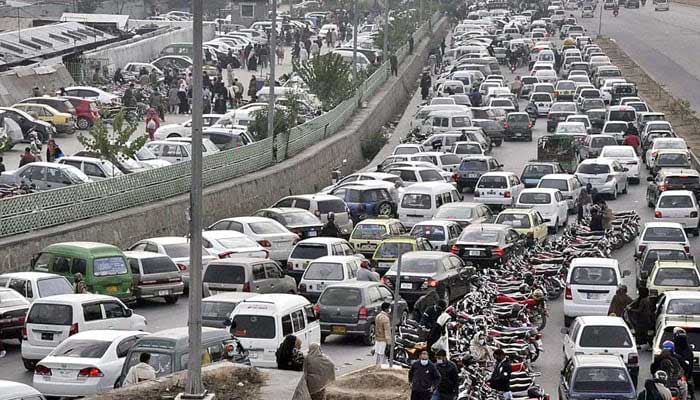 This file photo shows a view of a massive traffic jam near H-9, Islamabad. — APP