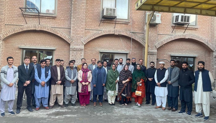 The newly elected office-bearers of PPA Khyber Pakhtunkhwa pose for a group photo during the oath-taking ceremony on December 27, 2025. — Facebook@muhammad.ilyas