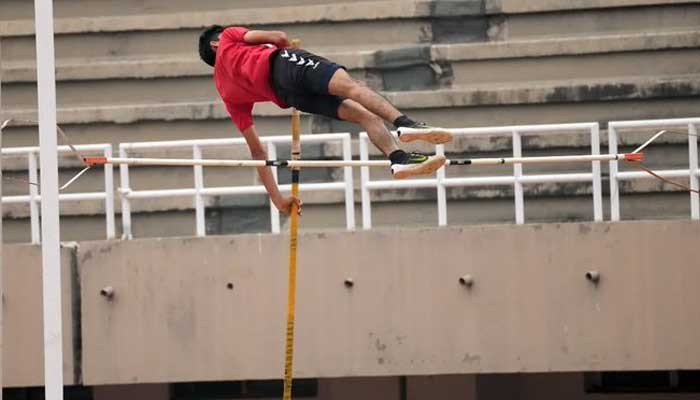 Pakistan Armys Asif establishes new national record of pole vault by clearing impressive height of 4.95 metresa at the 53rd National Athletics, Jinnah Stadium, Islamabad. — Facebook/@PakistanSportsBoard