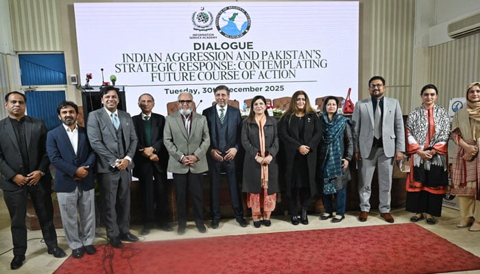 Group photo of the panellists of the dialogue Indian Aggression and Pakistans Strategic Response with ISA Executive Director Imrana Wazir at ISA on December 30, 2025. — APP