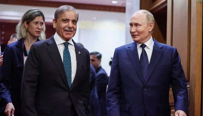 Prime Minister Shehbaz Sharif (left) meets Russian President Vladimir Putin at the Diaoyutai State Guesthouse in Beijing on September 2, 2025. — AFP