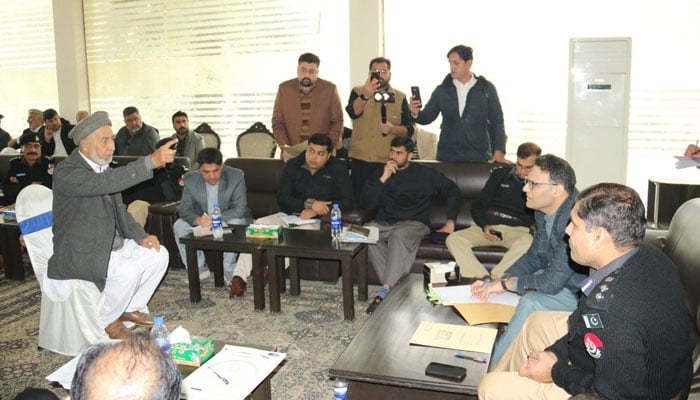 Deputy Commissioner Wasif Rehman and District Police Officer Masood Ahmed Bangash are seen at a khuli kutchehry in police lines on January 1, 2025. — Facebook@DCMardan