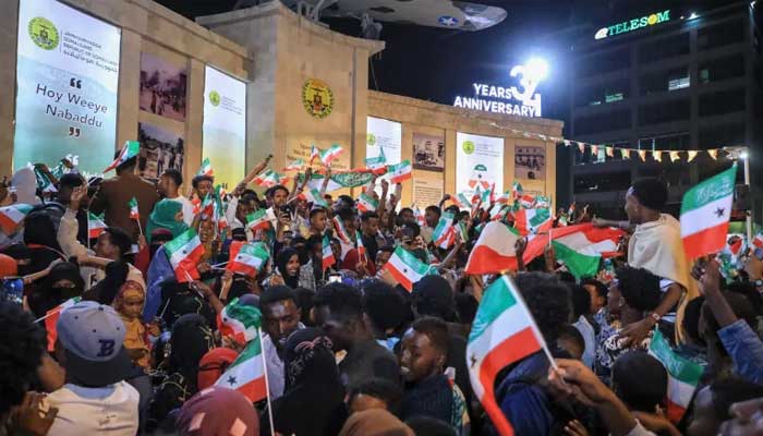 Residents celebrate Israels recognition of Somaliland in downtown Hargeisa. — AFP/File