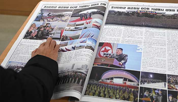 A visitor reads Rodong Sinmun, North Koreas top newspaper, at the National Library of Korea in Seoul on January 2, 2026. — AFP