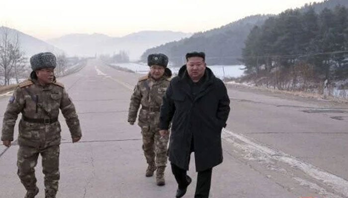 This picture released by North Koreas official Korean Central News Agency (KCNA) shows North Korean leader Kim Jong Un (right) inspecting a missile launch exercise in Pyongyang. — AFP