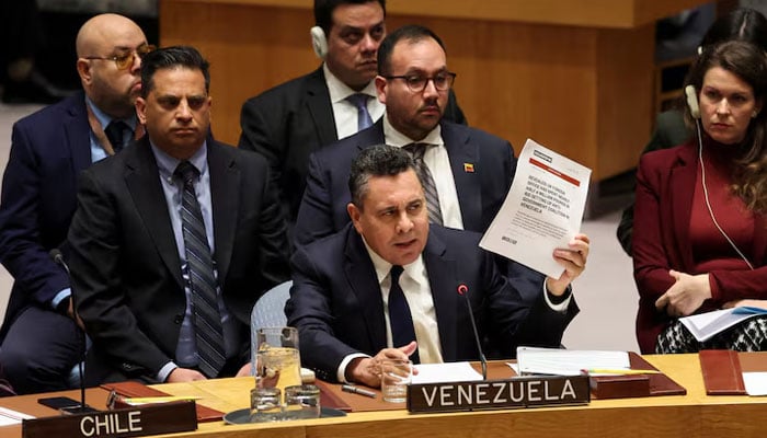 Venezuela Ambassador to the United Nations Samuel Reinaldo Moncada Acosta speaks as he holds up a news article, during a UN Security Council meeting on U.S. strikes and the capture of Venezuelan President Nicolas Maduro and his wife, Cilia Flores, at the United Nations headquarters in New York, US, January 5, 2026.—Reuters
