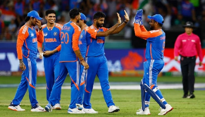 India’s Jasprit Bumrah celebrates with teammates after dismissing Pakistan’s Mohammad Haris, caught by Hardik Pandya, during the Asia Cup match in Dubai on September 14, 2025.—Reuters