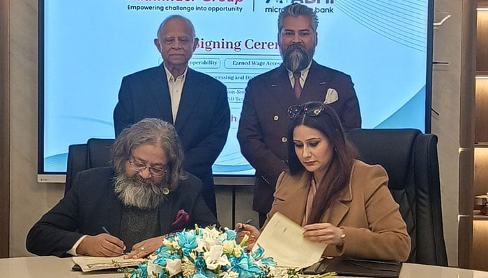 ABHI Microfinance Bank Limited and Pathfinder Group officials pictured during signing of MoU. — Reporter