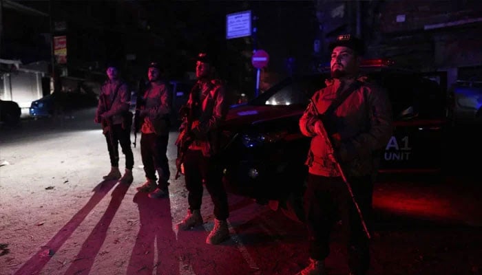 Security forces affiliated with the Ministry of the Interior stand guard in the Ashrafieh neighborhood, which they have taken control of, according to the Ministry of the Interior, following battles with the Syrian Democratic Forces, in Aleppo, Syria, January 9, 2026. —Reuters