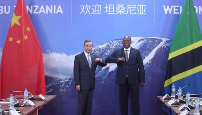 Visiting Chinese State Councilor and Foreign Minister Wang Yi (left) meets with Tanzanian Minister of Foreign Affairs and East African Cooperation Palamagamba Kabudi in Chato, Tanzania, January 8, 2021. —Xinhua