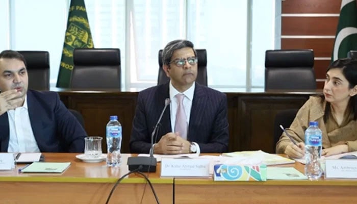 Dr Kabir Ahmed Sidhu (centre) seen during the media workshop organised by the Competition Commission of Pakistan. — Facebook@ccp.gov.pk/File