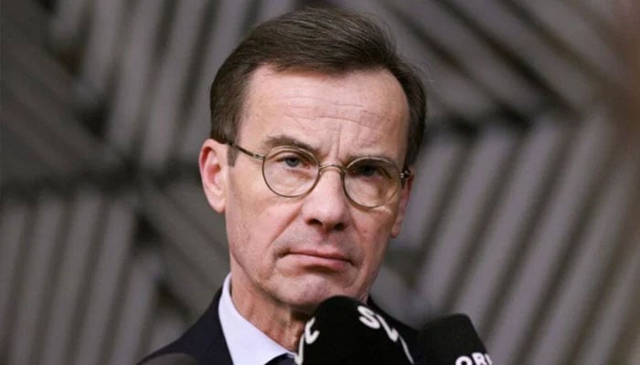 Swedish Prime Minister Ulf Kristersson speaks to the press prior to an European Council meeting at the EU headquarters in Brussels on December 19, 2024. —AFP
