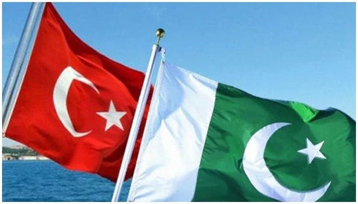 Photo showing the flags of Turkey (left) with Pakistan flag. — AFP/File