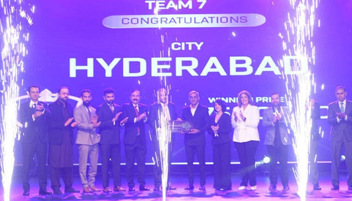 Chairman Pakistan Cricket Board Mohsin Naqvi (sixth-left) with awarding PSLs new team to members representing FKS who bought it during its auction held in Islamabad, Pakistan, on January 8, 2025.—X@thePSLt20