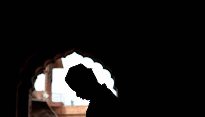 A Muslim man offers prayers during Jumat-ul-Vida, or the last Friday of the holy fasting month of Ramadan, inside Jama Masjid (Grand Mosque) in the old quarters of Delhi, India, April 5, 2024.—Reuters
