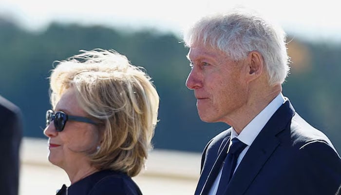 Former US President Bill Clinton and former US Secretary of State Hillary Clinton arrive at Dobbins Air Reserve Base, Marietta, Georgia, US, November 28, 2023.—Reuters