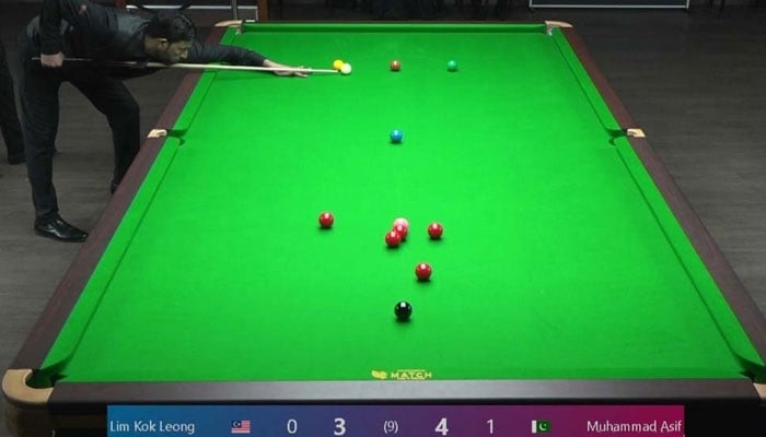 Pakistans cueist Muhammad Asif in action during the Asian 6-Red Snooker Championship in Colombo on June 24, 2025. — Reporter/Faizan Lakhani