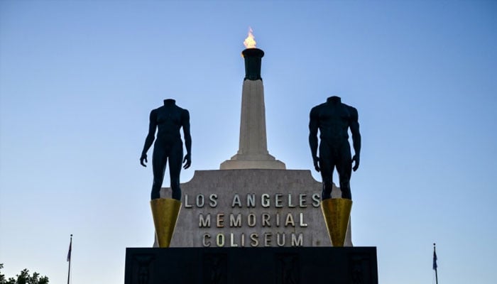 The LA28 Olympic cauldron is lit after a ceremonial lighting at the Memorial Coliseum ahead of the opening of registration for tickets to the Games. —AFP/File