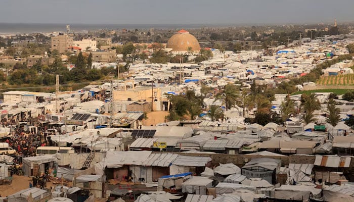 Displaced Palestinians shelter at a tent camp in Khan Younis, southern Gaza Strip, January 14, 2026.—Reuters