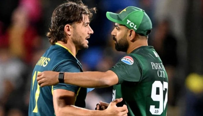 Australian batsman Marcus Stoinis (left) embraces Pakistan bowler Haris Rauf (right) after the third Twenty20 international cricket match between Australia and Pakistan at the Bellerive Oval in Hobart on November 18, 2024. — AFP