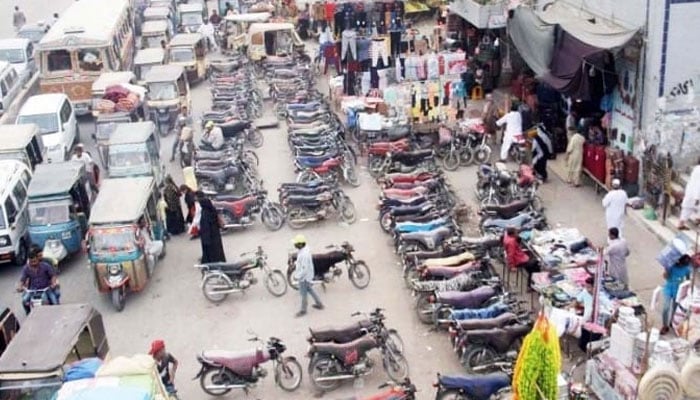 This representational image shows an illegally charged parking site in Karachi. — Online/File