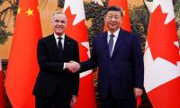 Canada, China Slash EV, Canola Tariffs In Reset Of Ties
