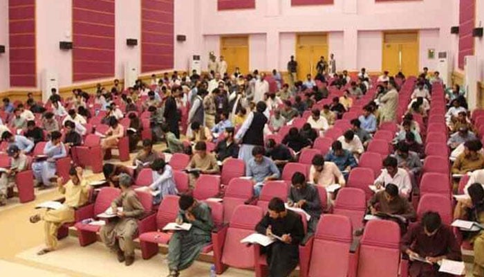 This representational image shows students appearing in an exam in Quetta on September 22, 2024. — X@jang_akhbar