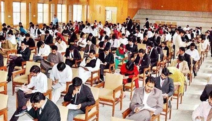 This picture shows students during an examination hall. — APP/File