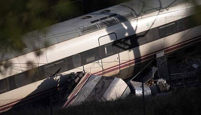 A picture taken on January 19, 2026 shows a view of one of the two trains that derailed the day before, killing at least 39 people and injuring more than 120, in Adamuz, southern Spain. — AFP