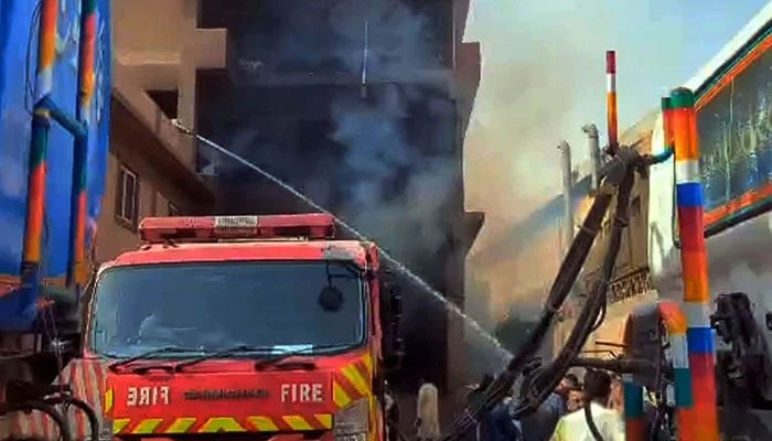 View of site after fire broke out at a cardboard factory as fire brigade officials are busy in extinguishing fire and rescue operation in Karachi on April 4, 2025. — PPI