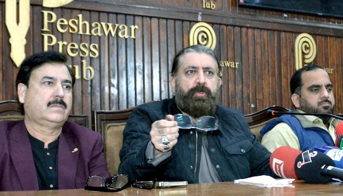 Pakistan Tehreek-e-Insaf (PTI) Information Secretary Sheikh Waqas Akram  addresses the media persons during a press conference at Peshawar Press Club on January 21, 2026. — PPI