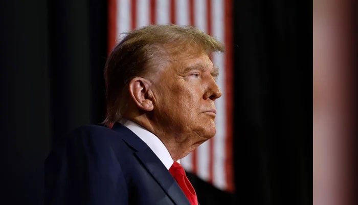 Republican presidential candidate and former President Donald Trump holds a campaign rally at the SNHU Arena in Manchester, New Hampshire on January 20, 2024. — AFP