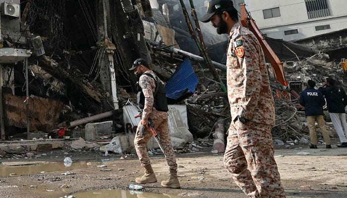 Rangers personnel are seen on the road in Karachi on January 22, 2026. — AFP