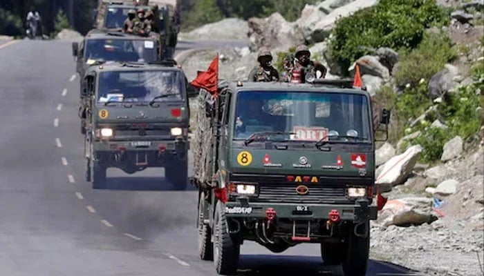 An Indian Army convoy moves along a highway leading to Ladakh, at Gagangeer in occupied Kashmirs Ganderbal district June 18, 2020. — Reuters
