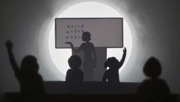 This representational photo shows an educator teaching students in a classroom. — Unsplash/File