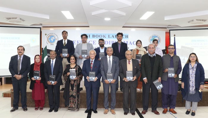 Participants pose for a group photo at the “Defence and diplomacy: a compilation of selected articles by SM Hali” book launching ceremony organised by ISSI on January 16, 2026. — Facebook@Institute.of.Strategic.Studies.Islamabad