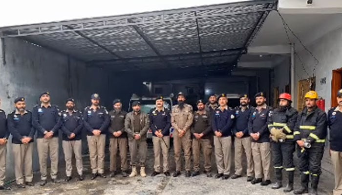 Rescue 1122 and Motorway police officials pose for a group photo after a training session on January 26, 2026. — Screengrab via Facebook@rescue1122haripur