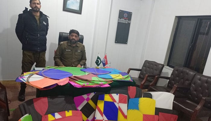 This image shows police officials posing with the confiscated kites on January 10, 2026. — Facebook@Rawalpindicpoofficeoffical