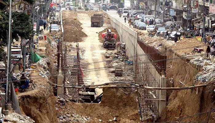 A view of the under-construction underpass at Karimabad. — APP/File