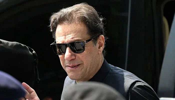 Pakistan Tehreek-e-Insaf (PTI) founder Imran Khan arrives to appear in the Supreme Court in Islamabad on July 24, 2023. — AFP