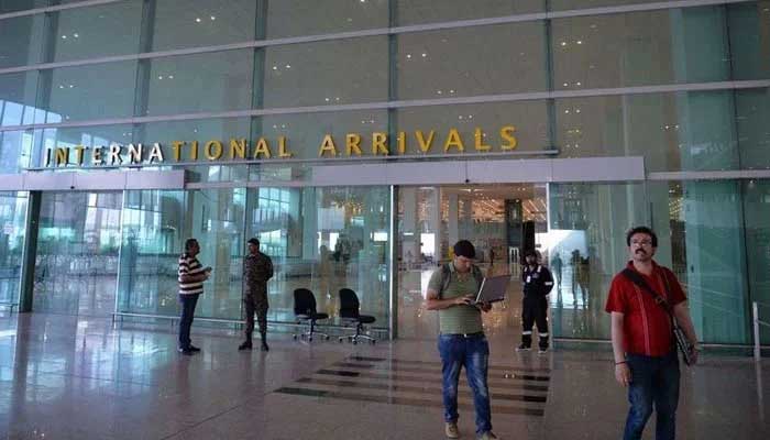 A photograph of the Islamabad airport shows travellers at the international arrival gate. — AFP/File