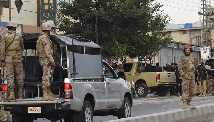 Paramilitary soldiers cordon off the site of a gunman attack on soldiers in Quetta, Balochistan. — AFP/File