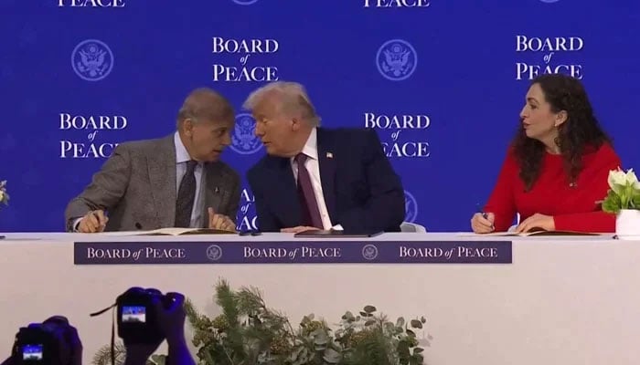 Prime Minister Shehbaz Sharif and President of Kosovo Vjosa Osmani sign Charter of the Board of Peace next to US President Donald Trump, as they take part in a charter announcement for his Board of Peace initiative alongside the 56th annual World Economic Forum (WEF), in Davos, Switzerland, January 22, 2026. — Reuters