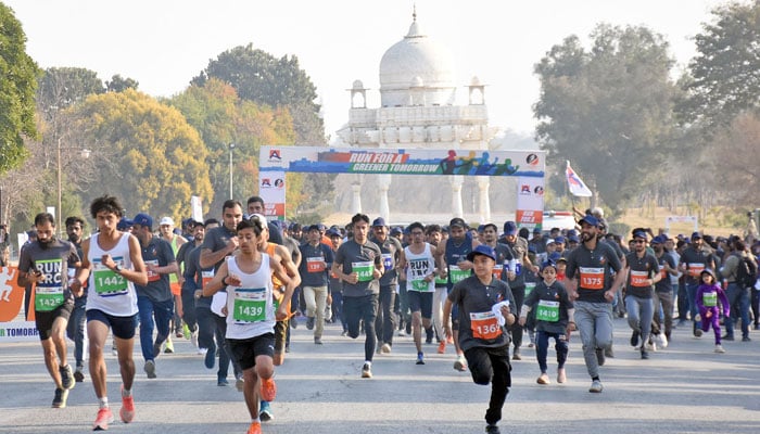 Runners participate during Marathon 2025 at Fatimah Jinnah Park, in Islamabad on February 9, 2025. — Online