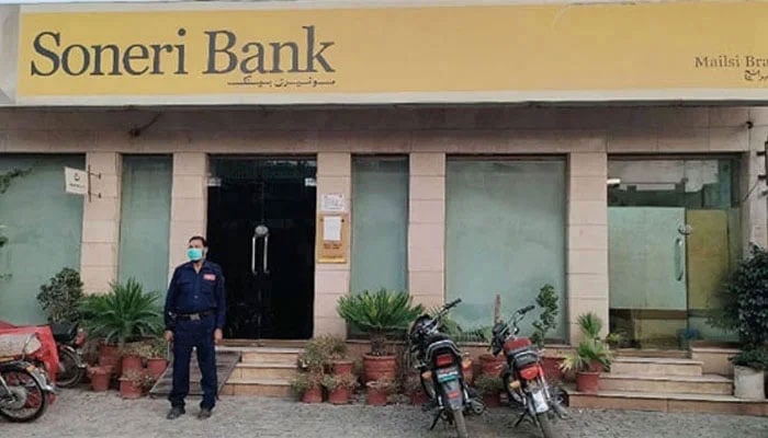 A security personnel standing outside a Soneri Bank branch in this image released on July 13, 2022. — Facebook@SoneriBankMailsibranch