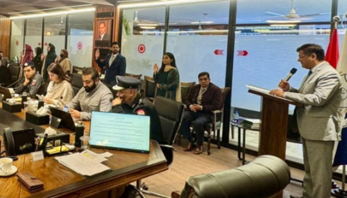 Secretary Home Punjab, Dr Ahmed Javed Qazi, administers the oath to the probation and parole officers at the Punjab Home Department on February 4, 2026. — Facebook@homedptpunjab
