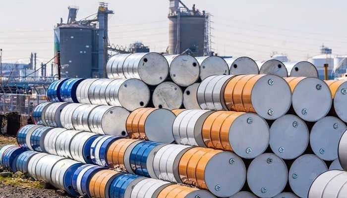 The representational image shows crude oil barrels stacked at a refinery. — APP/File